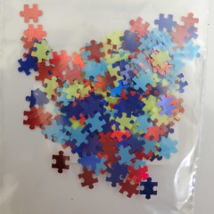 Pièces de puzzle à paillettes emballées